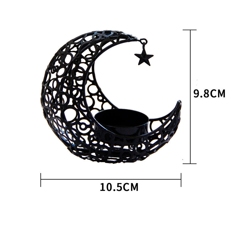 Black metal moon-shaped candle holder with star detail and measurements on a white background