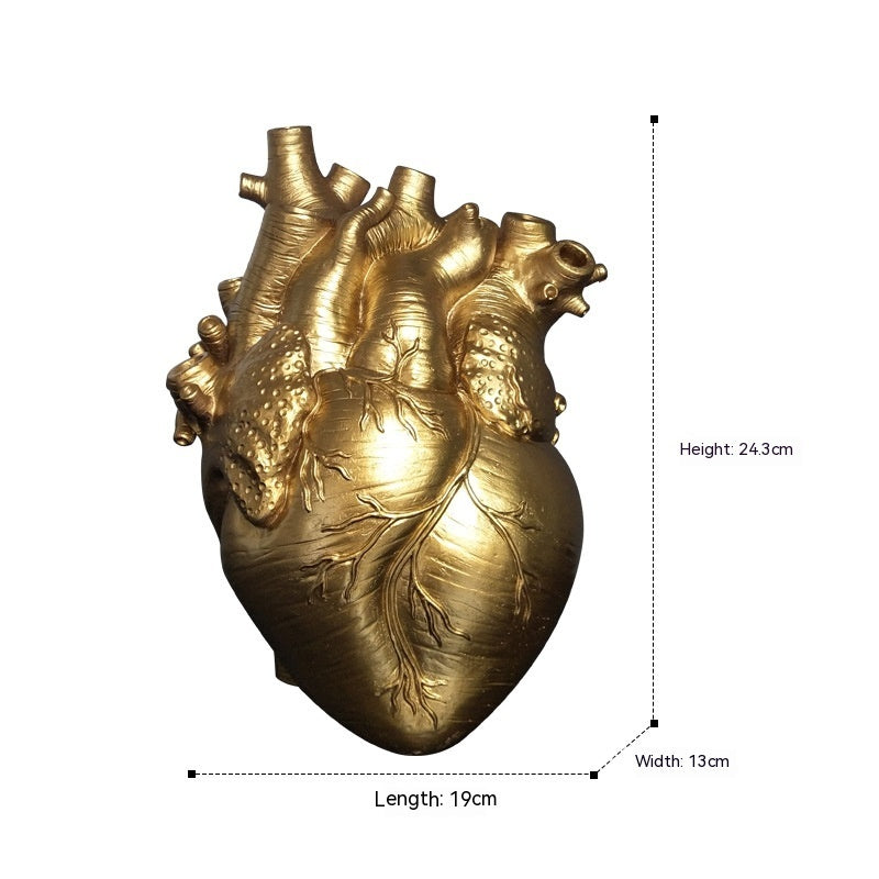 Gold heart-shaped object with shipping to UK