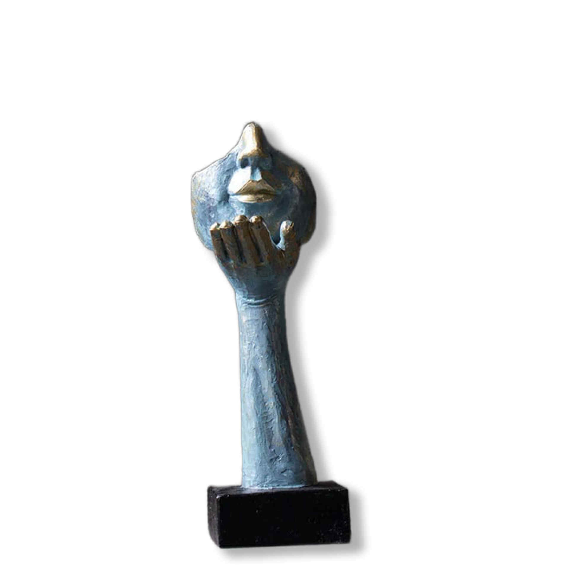 Decorative object resembling a hand holding a mask on a white background