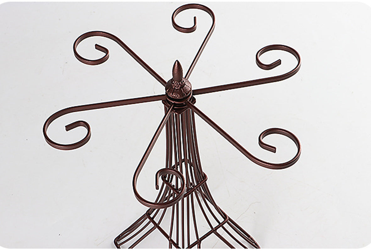 Decorative metal wall art with intricate designs on a white background