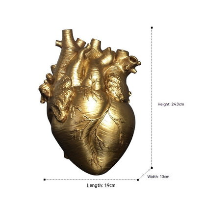 Gold heart-shaped object with shipping to UK