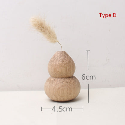 Decorative gourd with pampas grass and measurements on a white background