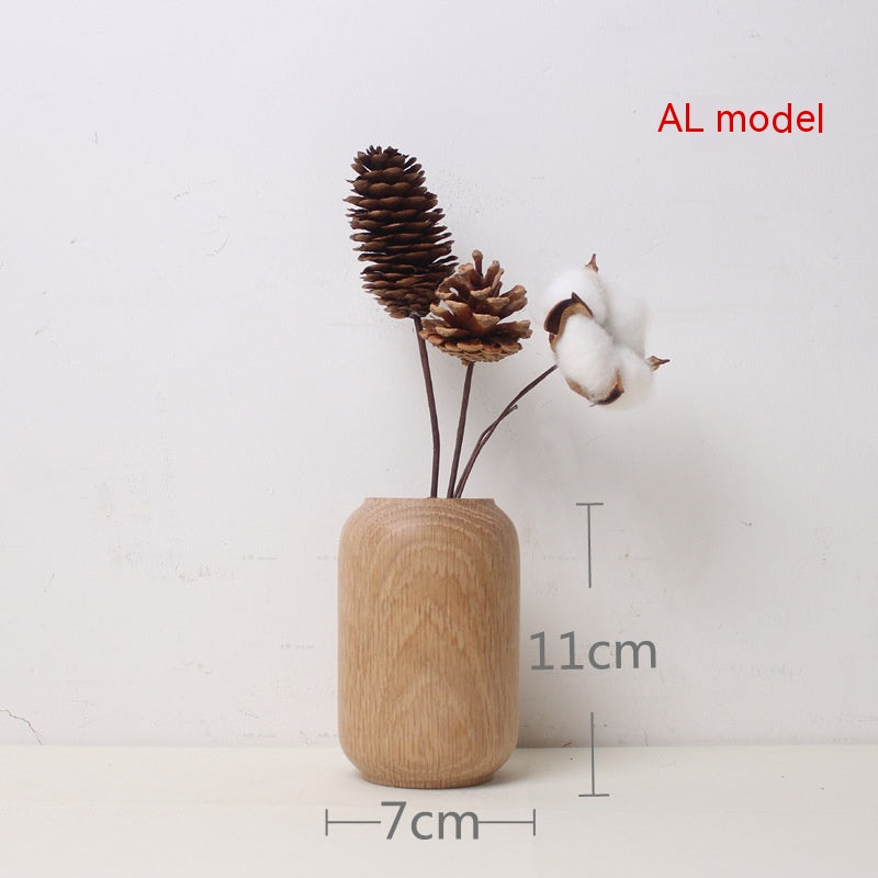 Wooden vase with decorative elements and measurements on a white background