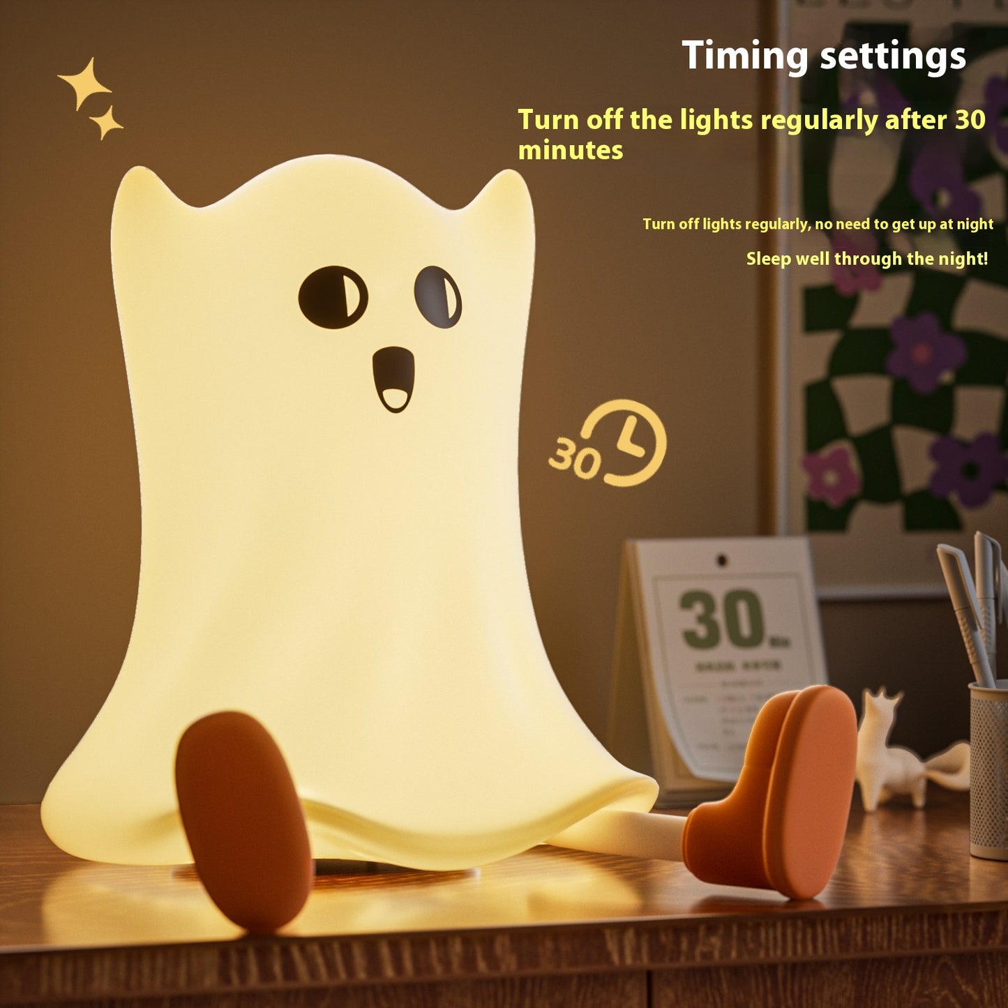 Ghost-shaped night light on a desk with timing settings text