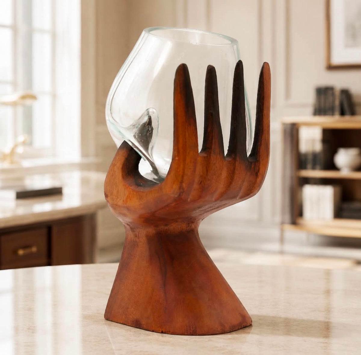 Carved Hand with Molten Glass Bowl