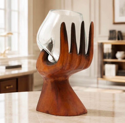 Carved Hand with Molten Glass Bowl